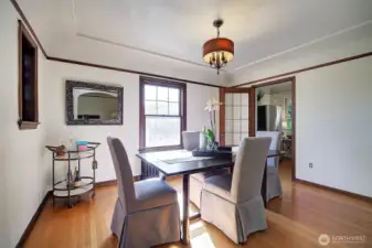 Spacious formal dining with lots of light and leaded class doors!