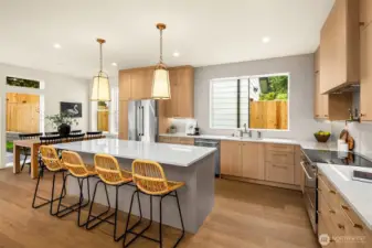 Beautiful chef's kitchen with large island, pot filler and upgraded Bosch appliances