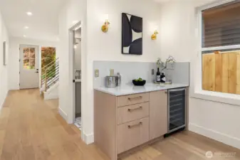 Beverage center with additional storage and bar top