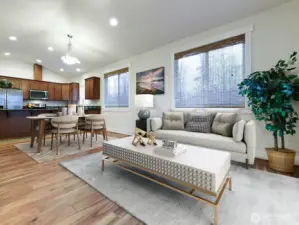 Virtually stages showing open floor plan. Dining area and living room.