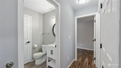 Downstairs bathroom with laundry room
