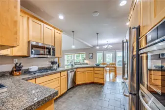 Spacious kitchen with radiant heated floors.