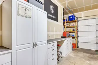 Built in storage and work area in garage.