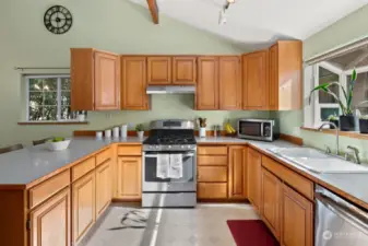 Kitchen offers great counter space and stainless appliances.