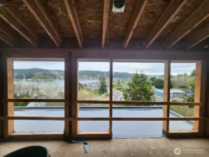 Windows and door out to deck.
