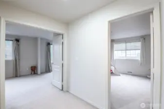 Hallway shows the two bedrooms.