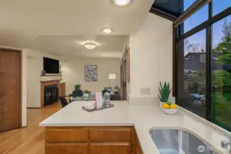 Check out the pantry space shown to the left and the wood burning fireplace beyond.
