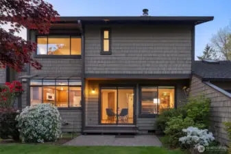 The back of the home faces south where you can enjoy natural light into the kitchen, dining and family rooms. Inviting back patio opens onto a beautifully landscaped greenbelt.