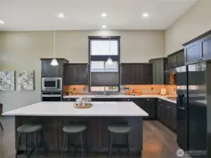 Large window in the kitchen adds light while fully adjustable blinds allow privacy.
