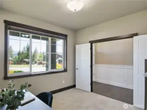 Office or study with lots of windows and blinds that are adjustable. Work from home or have plenty of room to study.