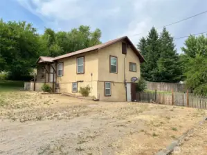 Front and side view of home plus parking area