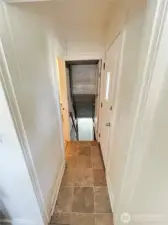 Upstairs hallway,off of kitchen and bathroom leading to Basement