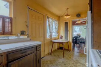 Step out on directly from the kitchen to the back wooden deck for a quick barbeque.