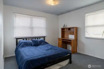 Bedroom #2 has a lot of natural light.