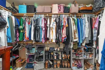 1st walk in closet for primary bedroom
