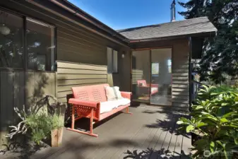 Sweet back south side deck looking out upon your back yard.