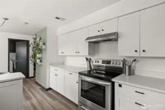 Kitchen looking towards laundry and hallway