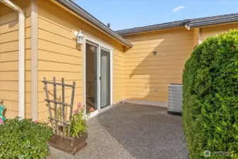 Private patio off primary bedroom.