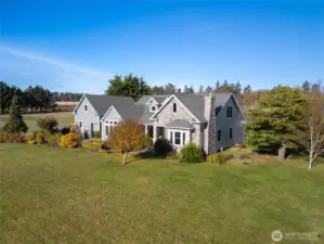 Rugosa and stem rose gardens highlight the front yard with color and seasonal beauty.