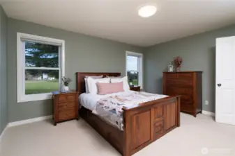 Primary suite with a large walk-in closet.