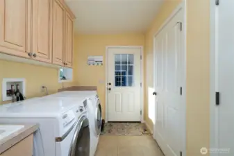Laundry room with utility sink.