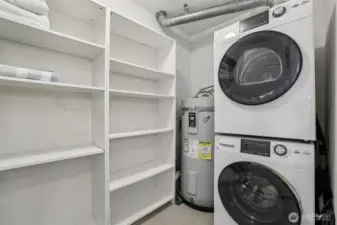 In-unit laundry is included in the sale, and the laundry room has tons of extra storage space!
