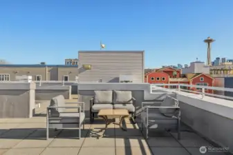 Relax with friends and mingle with neighbors up here - you'll love taking advantage of this space in the summer!