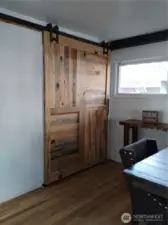 Handmade door view of utility closet