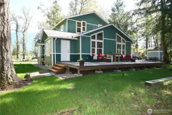A generous deck creates the perfect setting for seamless indoor-outdoor living.