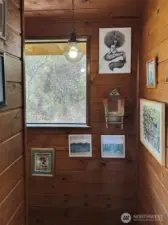 Coming up the stairs.