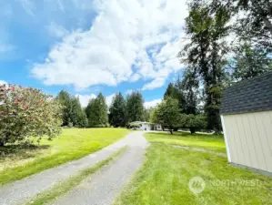 NW Corner of Property - Driveway Entrance. Tuff Shed Storage.