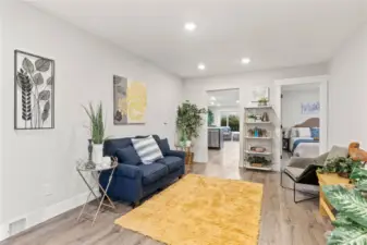 Family Room w/Recessed Lighting, Laminate Flooring and new White Millwork and Doors.