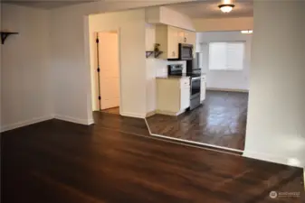 Living room also showing hallway to bedrooms and bath.