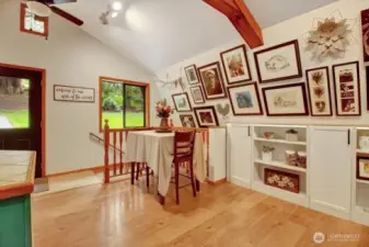 The dining area and stairs to the lower level