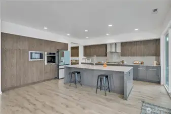 OK, let's talk about this kitchen! A full wall of storage, a wall oven and a wall microwave. It's the best kitchen layout ever.