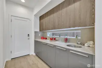 The wet-bar has more storage than some kitchens do!