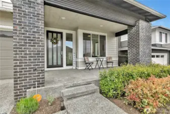 Imagine yourself enjoying the summer sunset from your covered front porch.