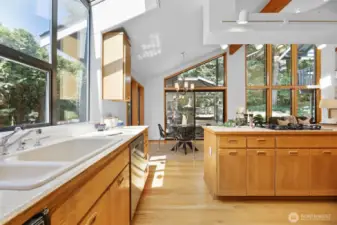 Wall of windows with natural light pouring in.