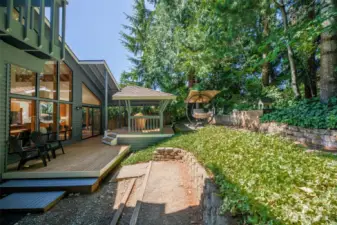 Tree-lined backyard and multiple decks for you to enjoy.