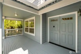 Covered entry porch to enjoy summer evenings.
