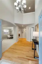 Beautiful open entry w/ vaulted ceilings.