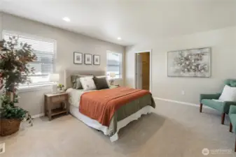 Primary suite with walk-in closet.