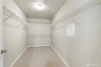 Primary walk-in closet.