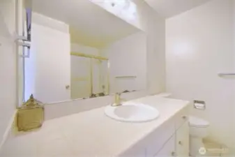 Hallway bath with full tub