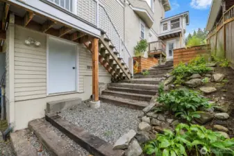 South side of the home. This door opens to the lower basement. Newer concrete foundation resulted in this additional basement.