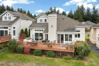 "The back deck offers a spacious layout with low-maintenance landscaping, perfect for relaxation and outdoor enjoyment.