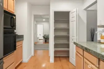 The generous pantry provides ample additional storage!