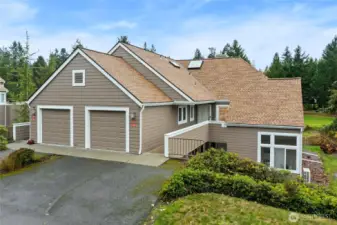 Unit 60C, on the right, boasts its own private garage with no-stair entry and is one of just four units in this intimate building. Crowned with a brand-new 40-year roof and freshly painted exterior, it’s move-in ready and built to last.