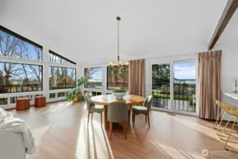 slider door out to West facing water and mountain views