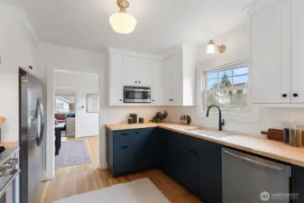 Beautifully designed kitchen with custom cabinets, new counters